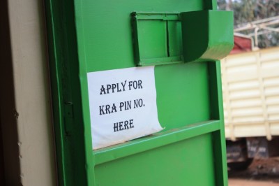 A sign advertising KRA Pin application services